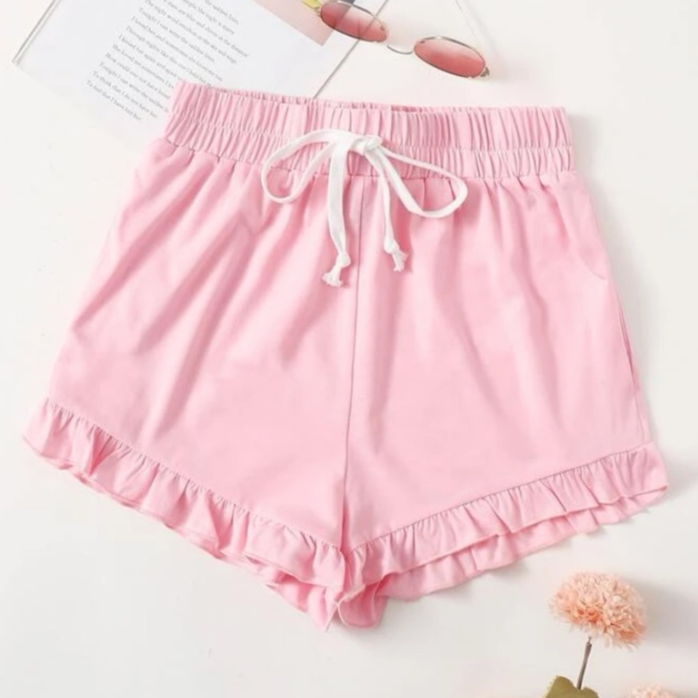 pink elastic shorts with deep pockets